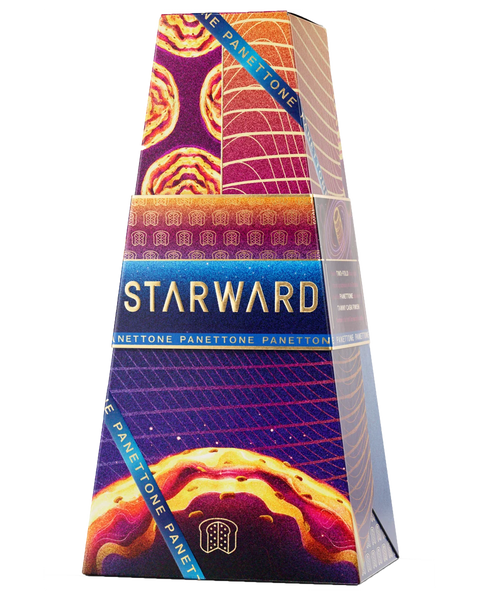 Starward Panettoney Whisky Box. Featuring a tall, narrow decorative box or package with a colorful space-themed design. The front prominently shows the word "STARWARD" in large gold letters on a blue band, with purple, orange, and yellow planetary artwork and blue diagonal text reading "PANETTONE" on the sides.